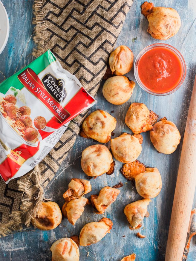 Meatball Marinara Bombs with pre-cooked Italian meatballs, pizza dough, mozzarella cheese and marinara sauce. Super fun snack idea, great for watch parties!