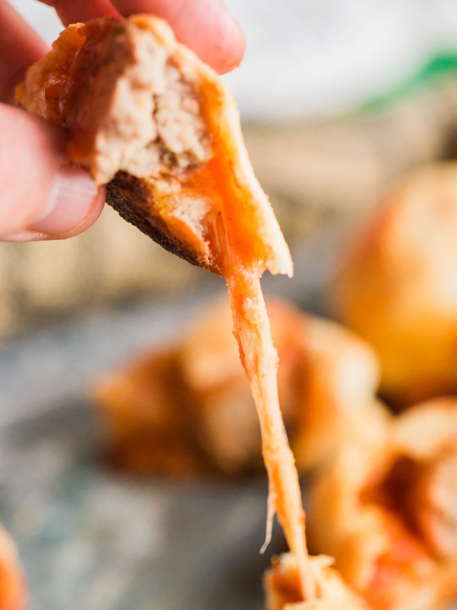 Meatball Marinara Bombs with pre-cooked Italian meatballs, pizza dough, mozzarella cheese and marinara sauce. Super fun snack idea, great for watch parties!