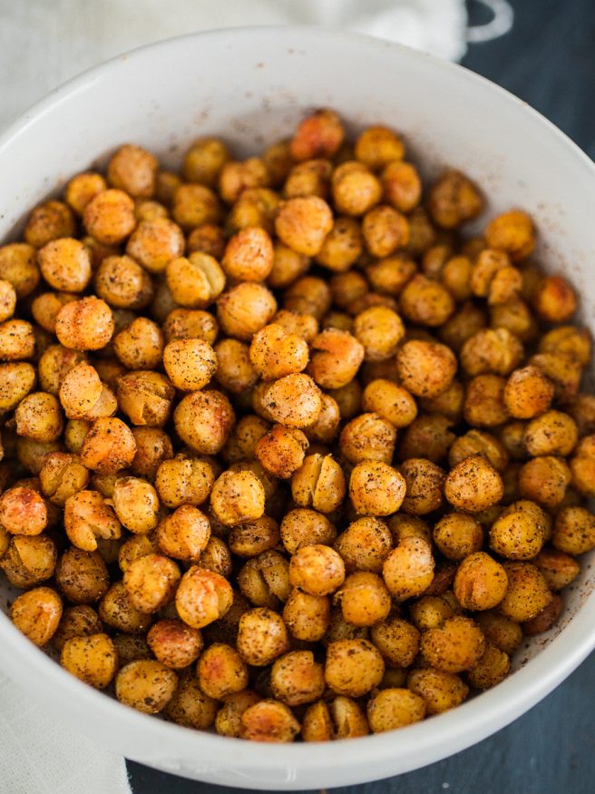 Roasted chickpeas with a from scratch chili seasoning. These roasted chickpeas taste amazing and are great to snack on when lounging around the house!