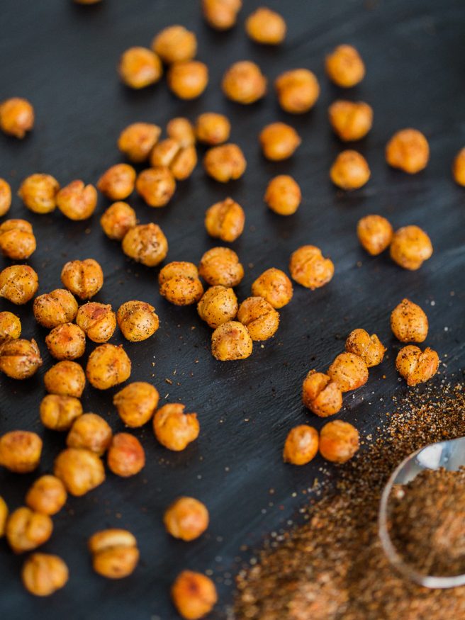 Roasted chickpeas with a from scratch chili seasoning. These roasted chickpeas taste amazing and are great to snack on when lounging around the house!