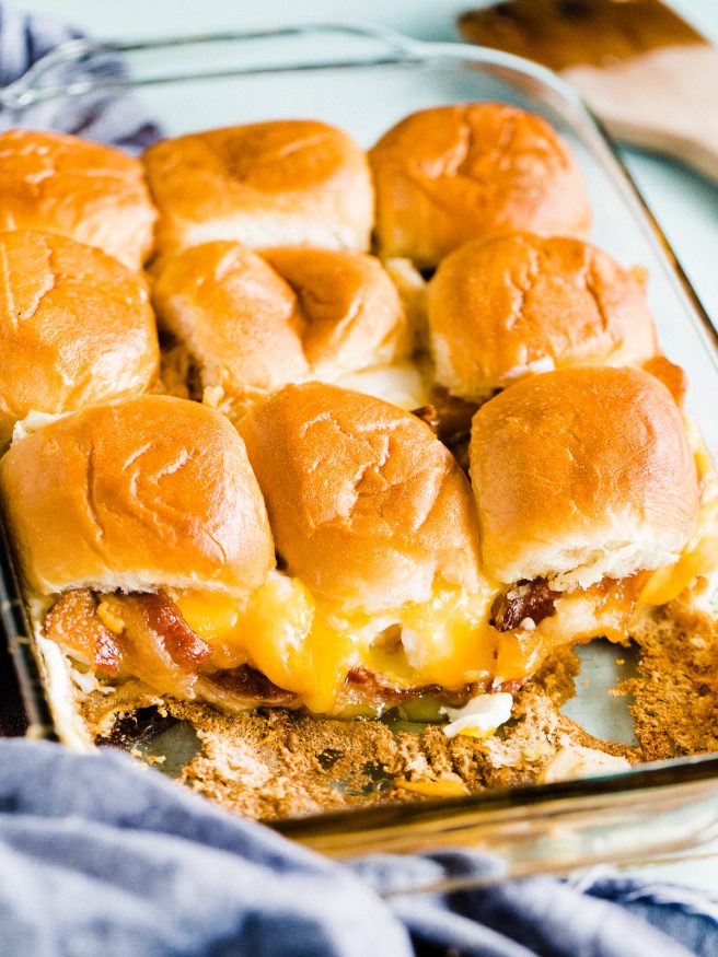 Breakfast Slider Casserole loaded with bacon eggs and cheese with Hawaiian rolls. Easy to serve up for brunch or a nice weekend breakfast with the family!