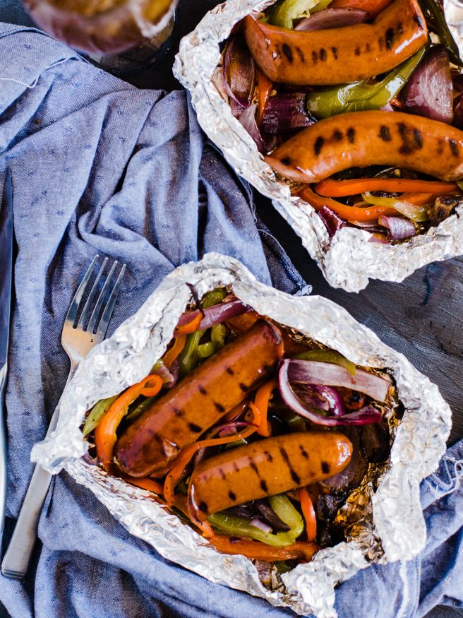 Sausage and Peppers done in foil packs making cooking, prep, and cleanup a breeze. Perfect for summer weeknights!