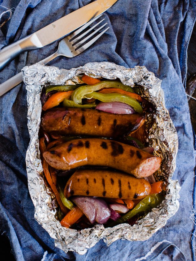 Sausage and Peppers done in foil packs making cooking, prep, and cleanup a breeze. Perfect for summer weeknights!