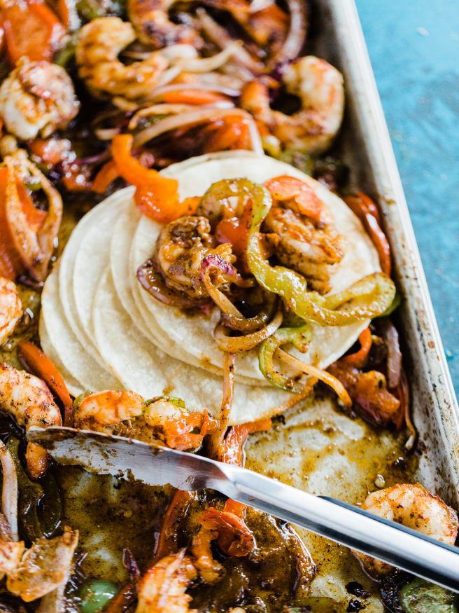 Spicy Shrimp fajitas with a homemade fajita seasoning. Cooked all on one sheet pan making this meal amazingly easy to prepare and cook!