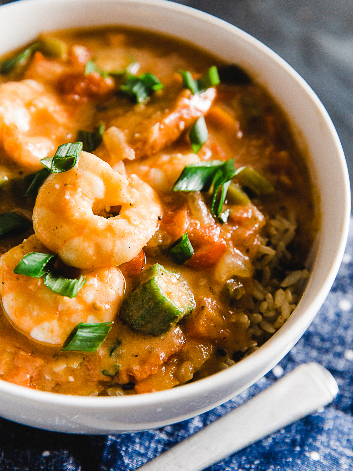 Spicy gumbo with shrimp sausage and okra dad with a pan