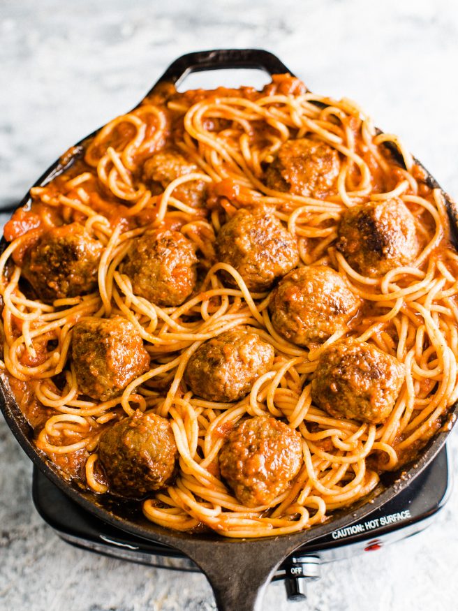 Spaghetti and Meatball Pot Pie is great one pan meal for the weekend. Spaghetti and Meatballs cooked with mozzarella and topped with pizza dough for crust!