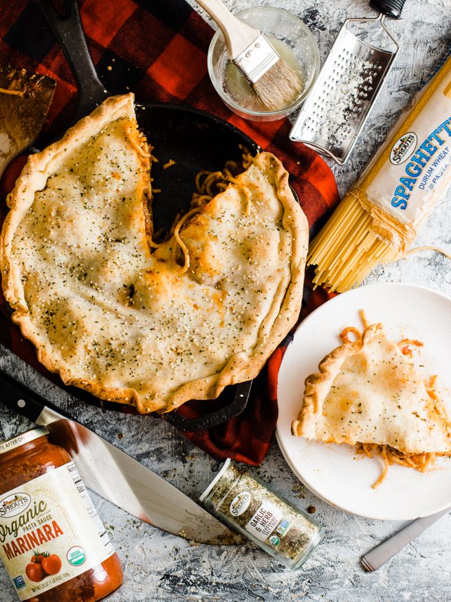 Spaghetti and Meatball Pot Pie is great one pan meal for the weekend. Spaghetti and Meatballs cooked with mozzarella and topped with pizza dough for crust!