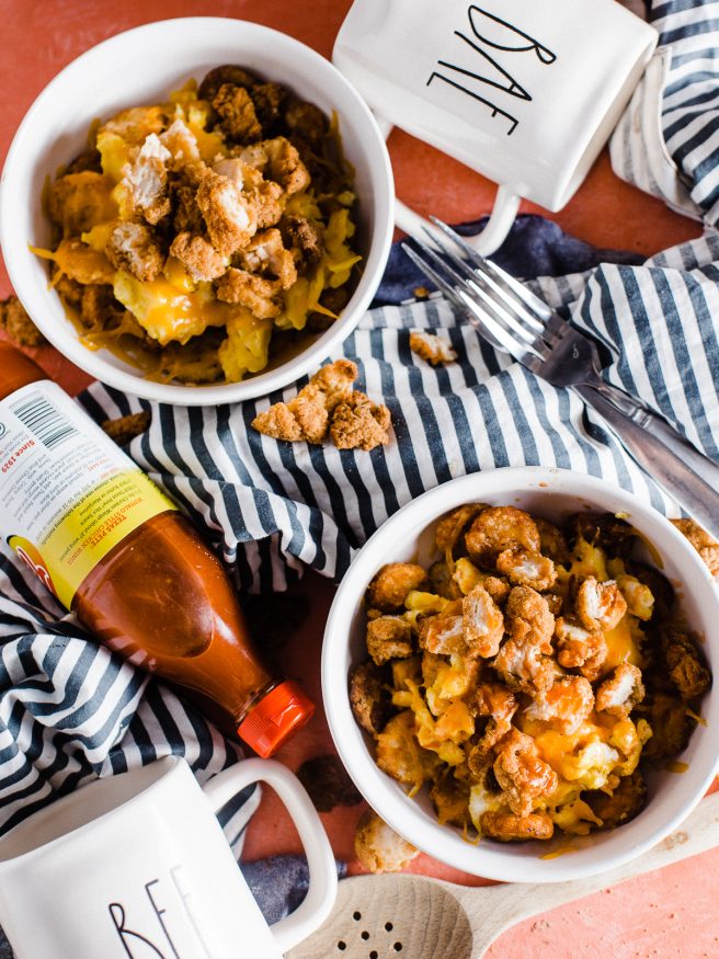 Chicken and Egg in a breakfast bowl?! It surprisingly works and is addictingly delicious! For the last few months we've been eating these Chicken and Scrambled Egg Hash Brown Bowls for breakfast from a breakfast spot near us, but I had to make my own version and share it because I love it that much!