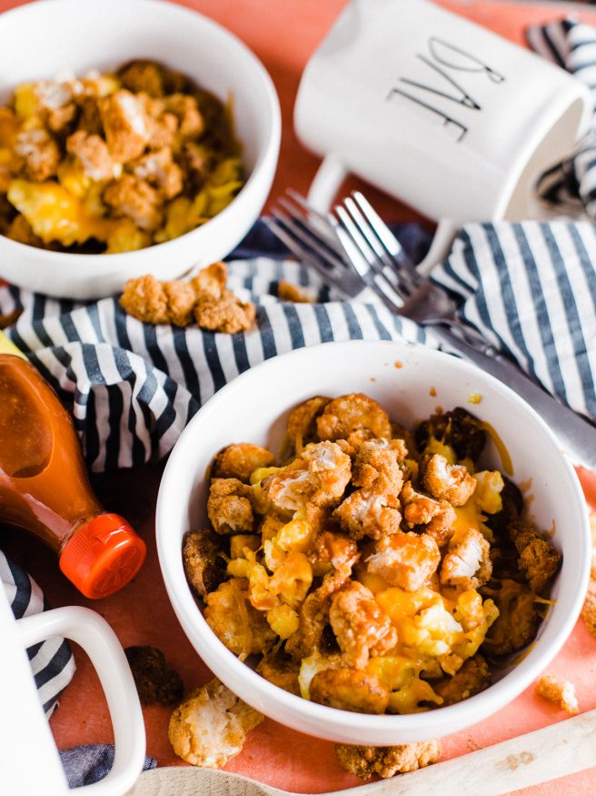 Chicken and Egg in a breakfast bowl?! It surprisingly works and is addictingly delicious! For the last few months we've been eating these Chicken and Scrambled Egg Hash Brown Bowls for breakfast from a breakfast spot near us, but I had to make my own version and share it because I love it that much!