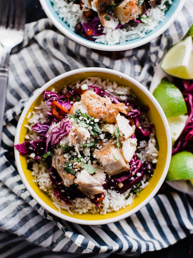 Fish Burrito Bowl with a spicy Cilantro Lime red cabbage slaw. Fresh and filling and makes a perfect weeknight meal! 