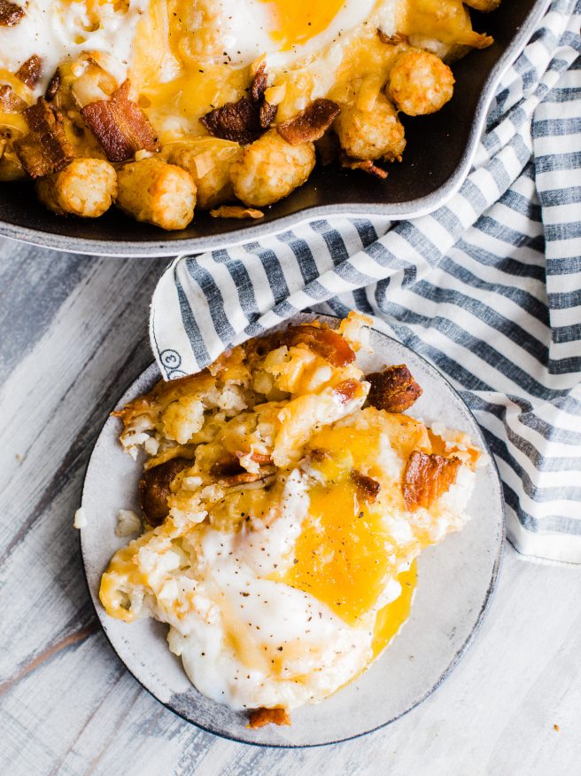 Making an easy breakfast dish with with Bacon Egg and Cheese Totchos. This makes the perfect candidate for a breakfast to cook up with the kids! 