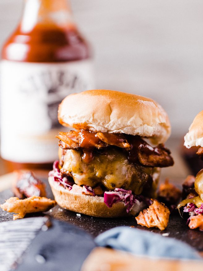 These Baby Back Ribs cheeseburger sliders, topped with a red cabbage slaw will blow your guests socks off this Fourth of July!