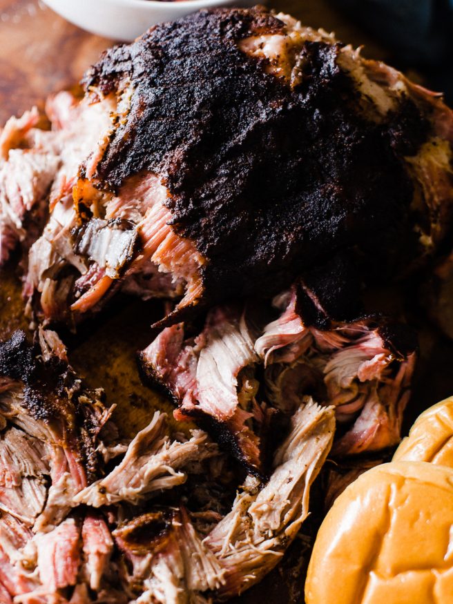 Smoked Pulled Pork Shoulder cooked low and slow over apple and hickory pellets. Coated with a pepper based central Texas style rub that makes for a one of a kind pulled pork that everyone will love! 