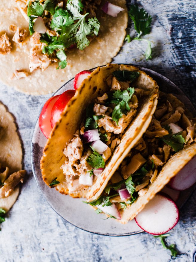 A great way to use smoked chicken, is throwing it in a taco! Smoked Chicken tacos take a twist on Taco Tuesday, and make a great leftover chicken idea!