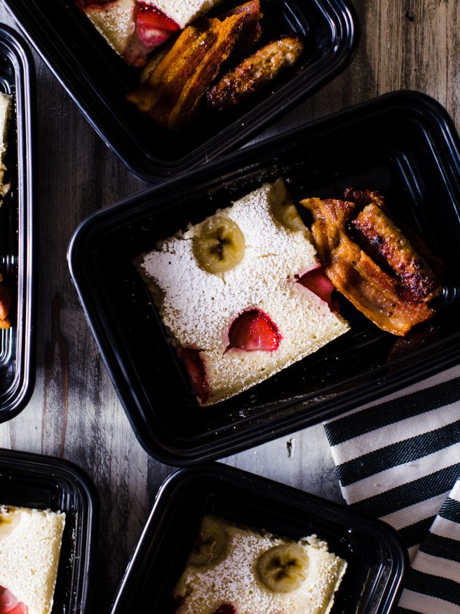 Sheet Pan Pancakes makes breakfast prep extremely easy. Adding fresh fruit on top of your pancakes in a sheet pan, to serve the whole family, or store in meal prep containers for the week! 