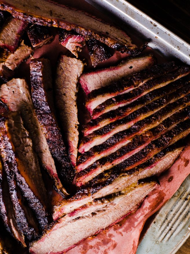 Low and Slow Smoked brisket with a simple pepper based Texas style rub. This is the perfect beginner recipe to get into brisket!