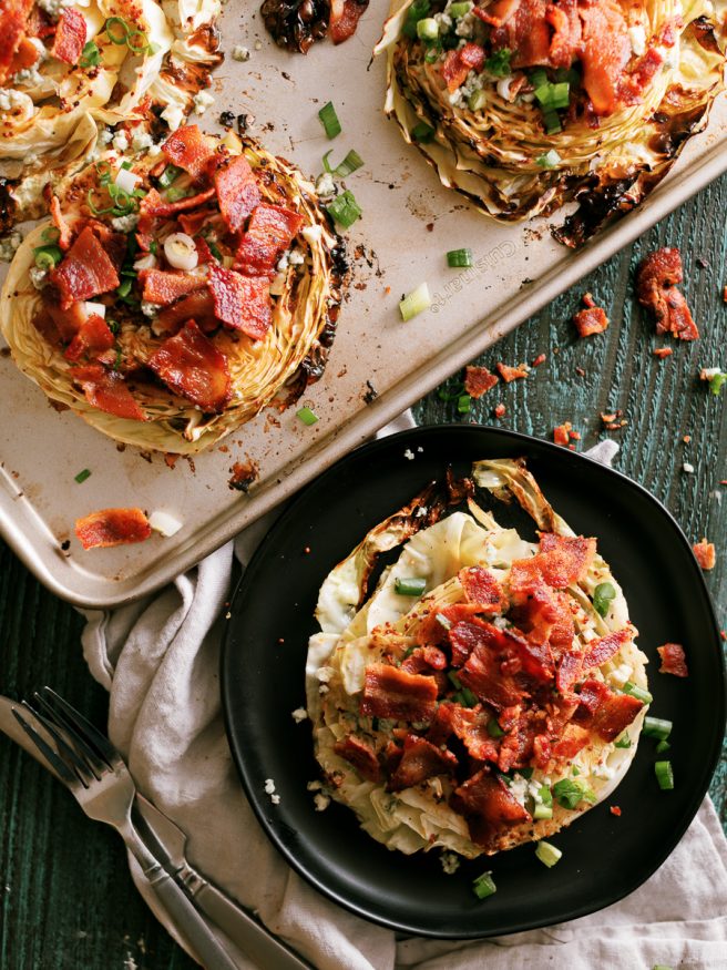 Roasted Cabbage Steaks topped with bacon and bleu-cheese make a great high protein low carb mean that has tons of flavor and easy to prep!