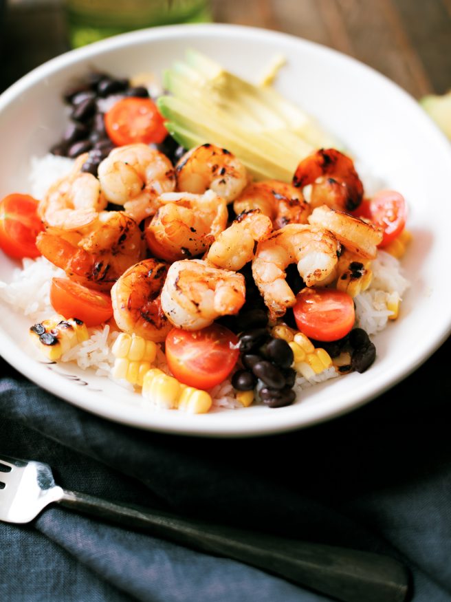 Spicy Honey Garlic Shrimp Bowl with a Honey Lime Garlic and Chili oil sauce that adds an amazing flavor with a little heat on the end!