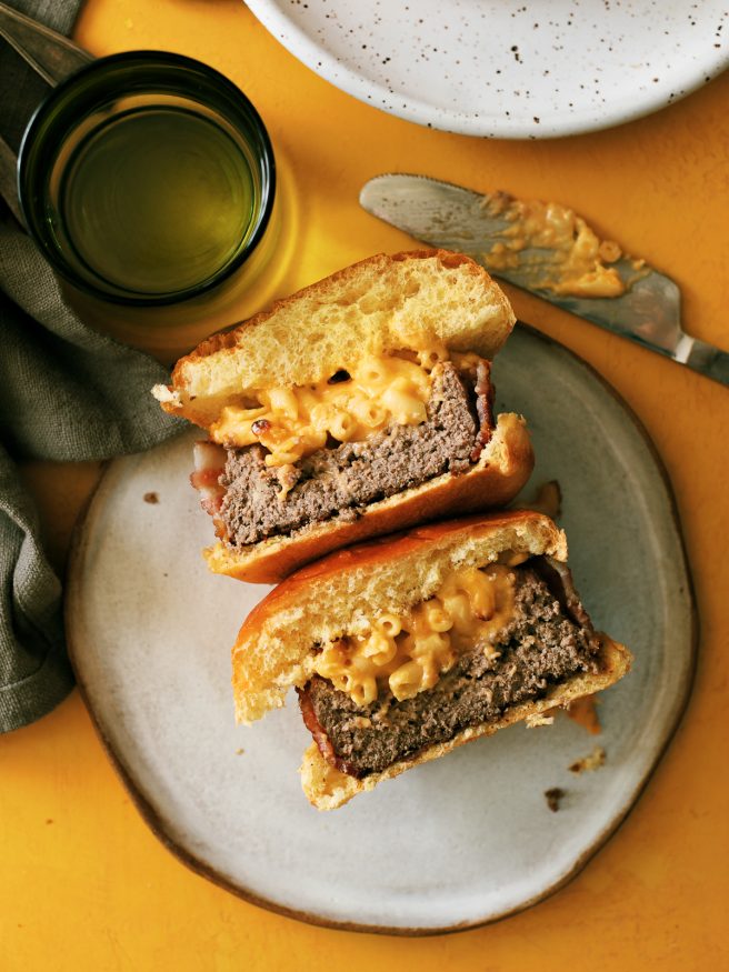 Bacon Wrapped Soda Can Burgers filled with Mac an Cheese for the kids, and grilled onion and mushroom with swiss for the adults! 