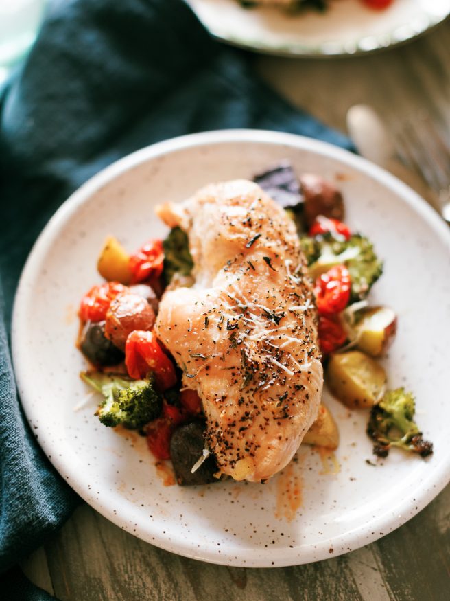 A heart healthy sheet pan garlic chicken and vegetable sheet pan recipe is bursting with flavor and an easy low-cholesterol chicken recipe!