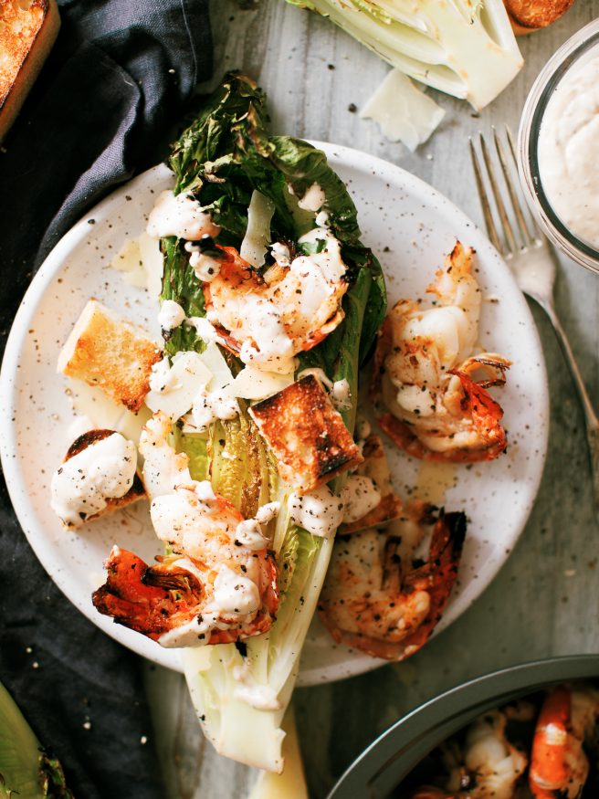 Grilled Caesar Salad, with grilled shrimp, grilled croutons, grilled romaine lettuce. The only thing that isn't grilled is the from scratch Caesar dressing!