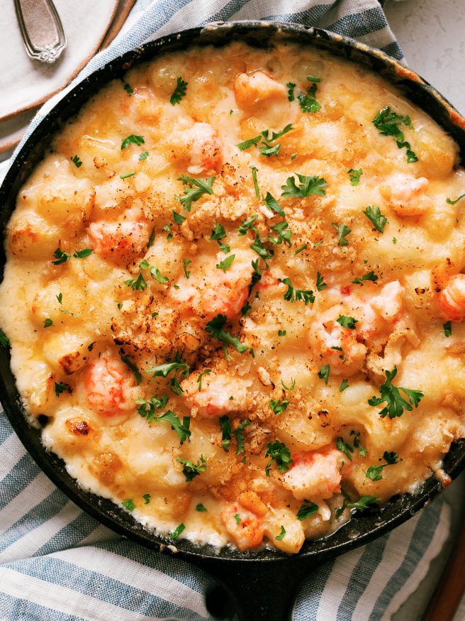 Lobster Gnocchi Mac and Cheese with fontina and cheddar cheese topped with a butter cracker crumb topping. The perfect way to do adult mac and cheese!