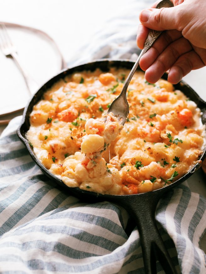 Lobster Gnocchi Mac and Cheese with fontina and cheddar cheese topped with a butter cracker crumb topping. The perfect way to do adult mac and cheese!