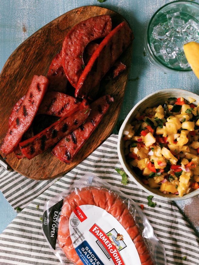 The smokiness from the sausage and bright, beautiful flavors from the pineapple
salsa go together perfectly in this awesome summer grilled sausage hoagie!
