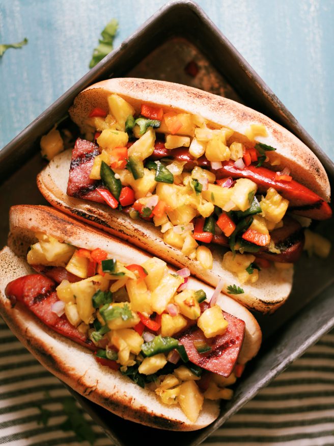 The smokiness from the sausage and bright, beautiful flavors from the pineapple
salsa go together perfectly in this awesome summer grilled sausage hoagie!
