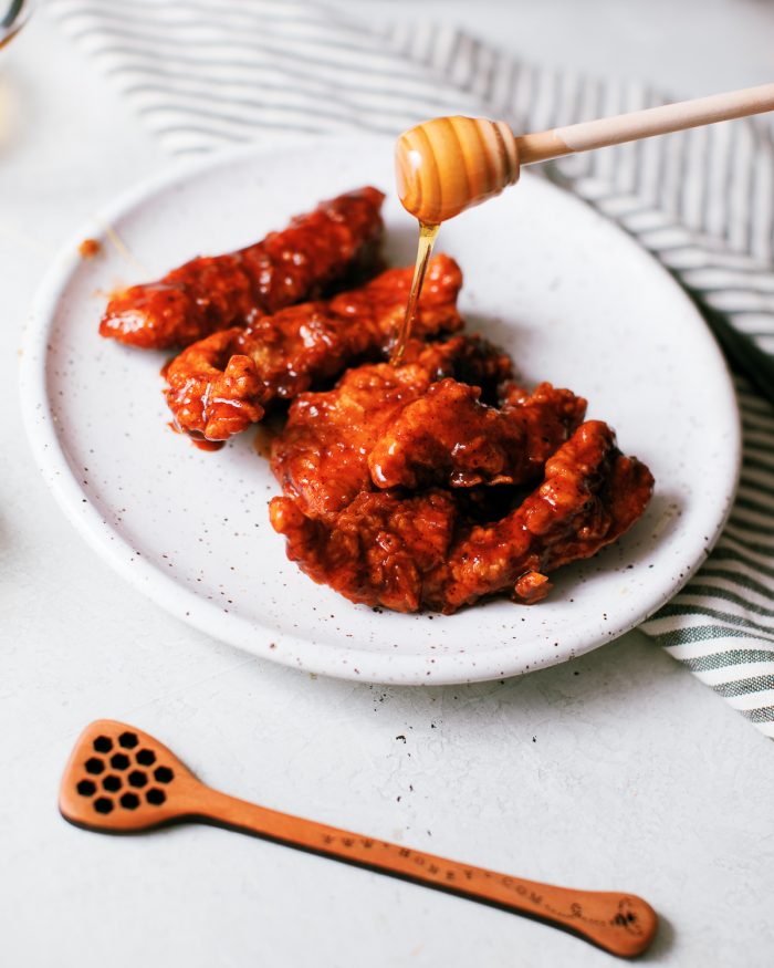 Fried Chicken Tenders made from scratch, then tossed in a spicy and sweet chipotle honey barbecue sauce.