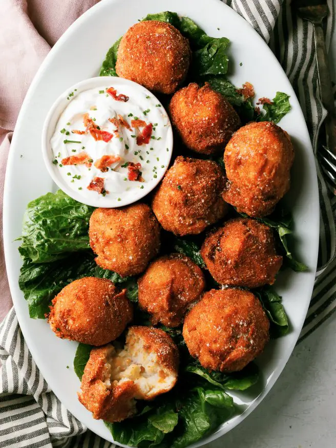 Fried Mashed Potato balls are loaded with cheese, bacon and a little garlic and herb seasoning. It’s the perfect thanksgiving app!