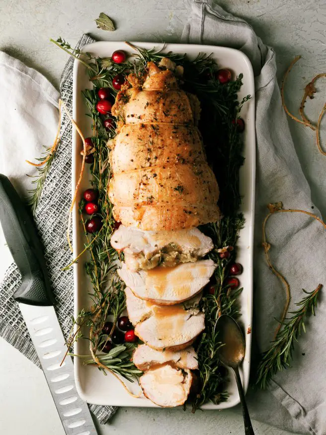 Roasted Turkey Breast tied in a roast, stuffed with an herbs and stuffing. Makes avoiding dark meat a thing of the past!