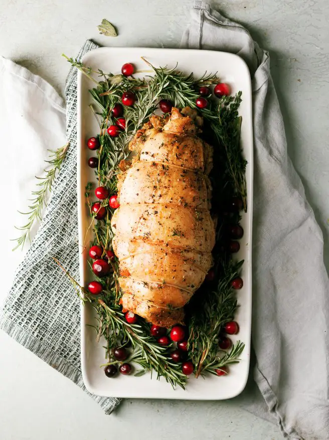 Roasted Turkey Breast tied in a roast, stuffed with an herbs and stuffing. Makes avoiding dark meat a thing of the past!