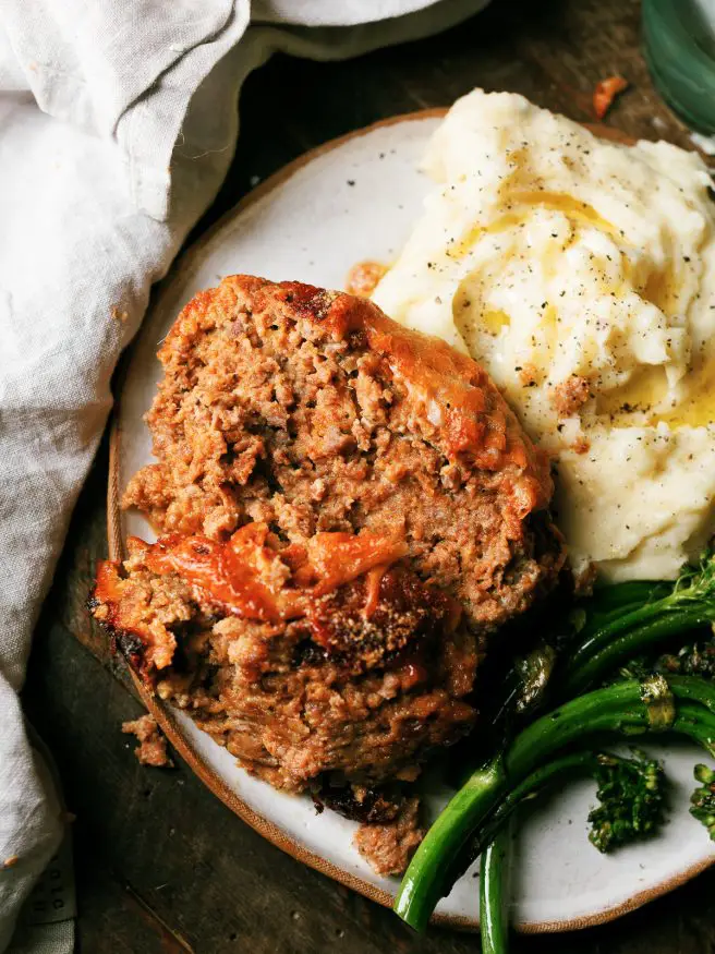 A solid meatloaf recipe with Parmesan cheese and Italian seasoned bread crumbs. Awesome comfort food! 