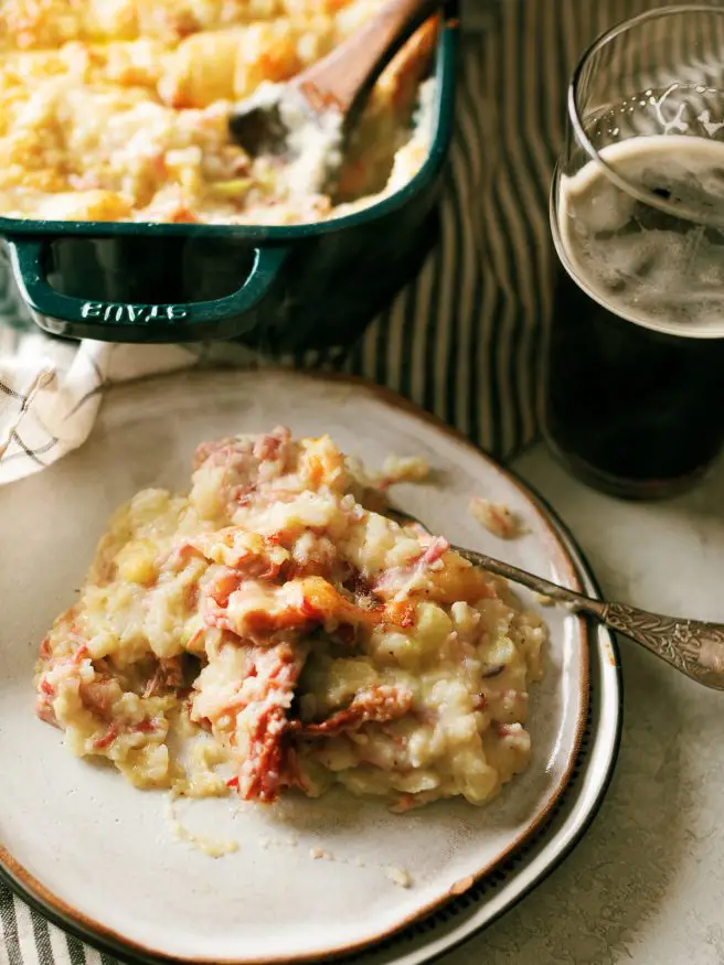 Use your leftover corned beef to make a Colcannon Corned Beef bake! Creamy mashed potatoes, tender cabbage, topped with aged cheddar.