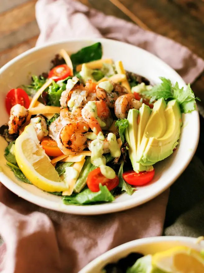 Grilled Shrimp Salad with Citrus Avocado Dressing seasoned with lemon garlic and a little cilantro. Perfect salad for the spring time! 