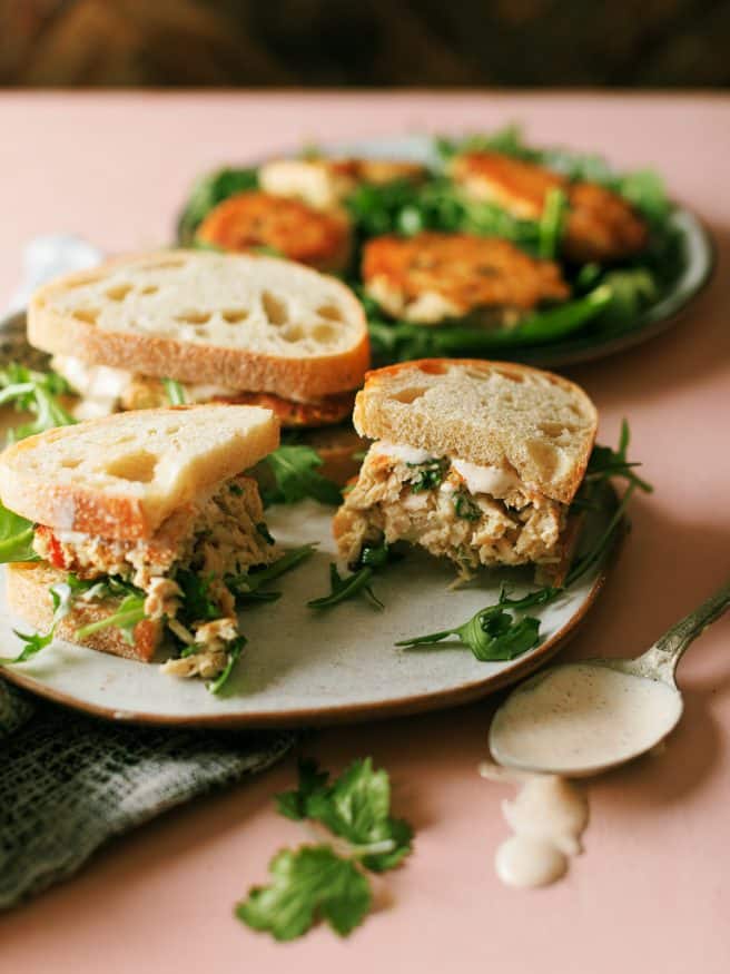 Tuna Fish Cake Sandwich packed with green onion, water chestnuts, jalapeno and topped off with an Old Bay Aioli that is amazing! 