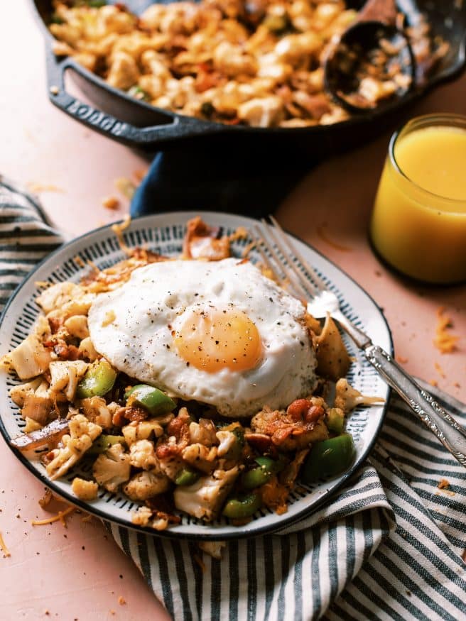 When you're craving skillet potatoes but can't, this cauliflower bacon hash recipe is just what you need to do the trick!