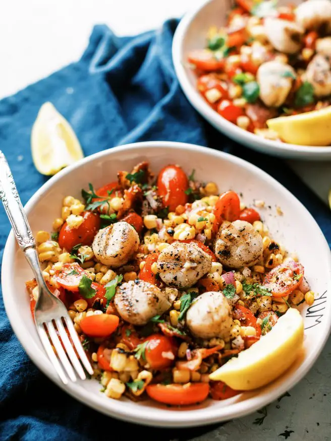 Bacon corn tomato salad with grilled scallops is a light and easy recipe to make for lunch or dinner. Its zesty, fresh, and full of flavor! 