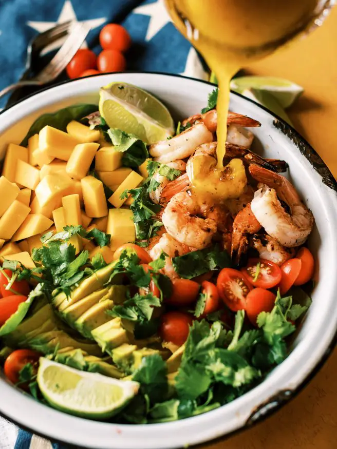 Grilled Shrimp Mango and Avocado Salad with a honey mustard vinaigrette. Doesn't get easier than that for summer dinner!
