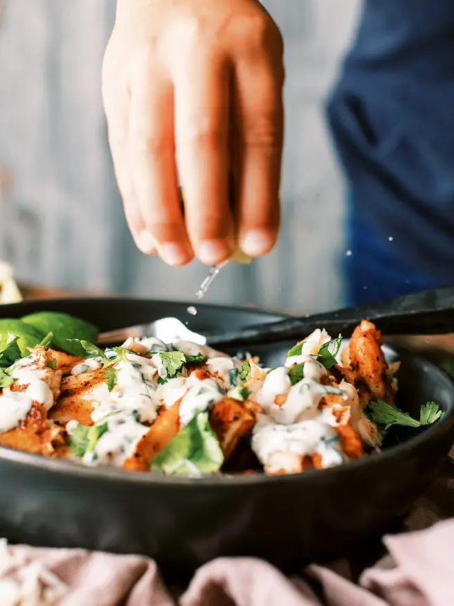 This grilled fish taco bowl is perfect for a weeknight. Beautiful fresh tilapia filets rubbed in a few simple spices, then topped with a cilantro aioli. 