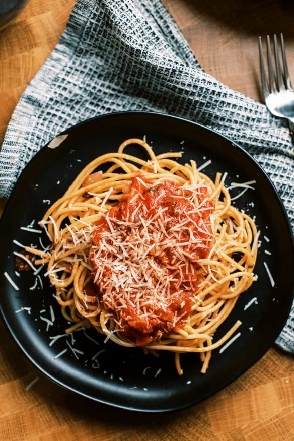 A quick and easy 30 minute marinara sauce that is done in about 30 minutes. Use fresh basil and oregano to really make this sauce pop!