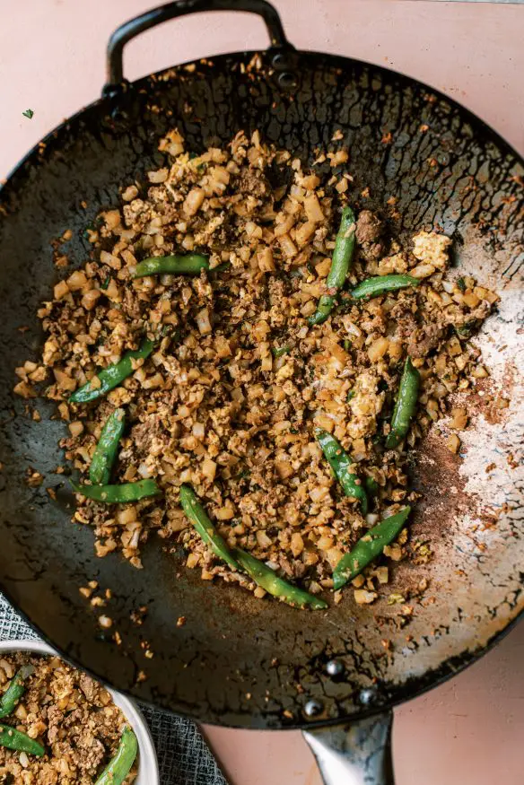 Cauliflower fried rice with beef is a great low carb, high protein keto friendly meal that will get your fried rice fix in!