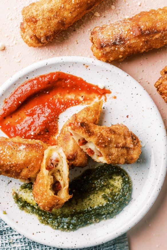 Pepperoni Pizza Egg rolls are exactly what they sound like. Peperoni, mozzarella and some Italian seasonings wrapped in an egg roll, then fried. 