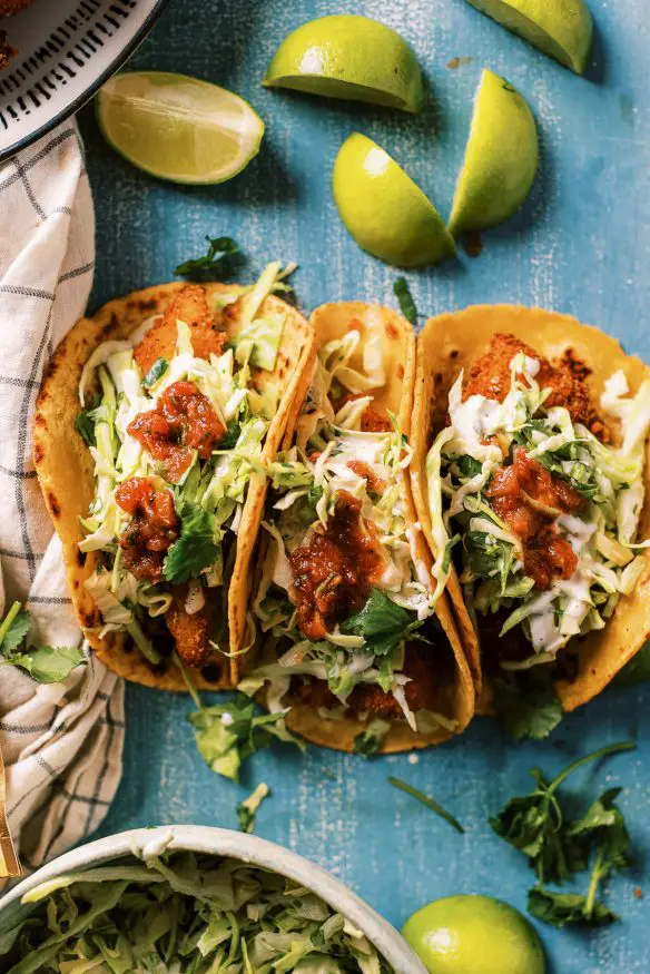 Instant Mashed Potato Crusted Fish Tacos are a must try! Using instant mashed potatoes as a breading for fish tacos, then fried to come out for a super crispy on the outside, tender and flakey on the inside! 