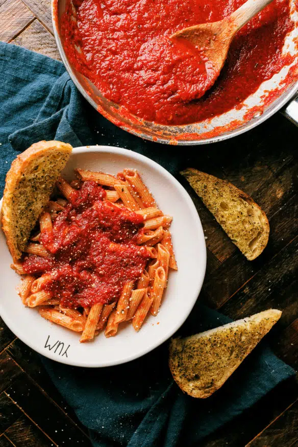 This easy 15 minute marinara sauce, is loaded with so much flavor it will taste like your grandma was in the kitchen all day making it. 