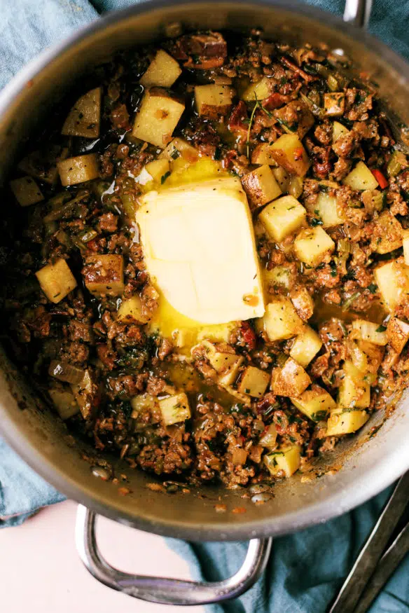 stuffing with real bread and bacon, italian sausage, sage, rosemary, thyme, a boat load of butter, and a some fresh pepper to give it a little kick