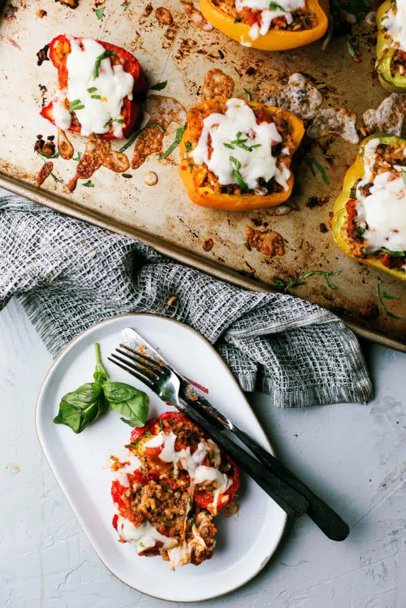 These Italian stuffed peppers are crammed with ground beef, Arborio rice, oregano, basil and other Italian spices and mozzarella cheese