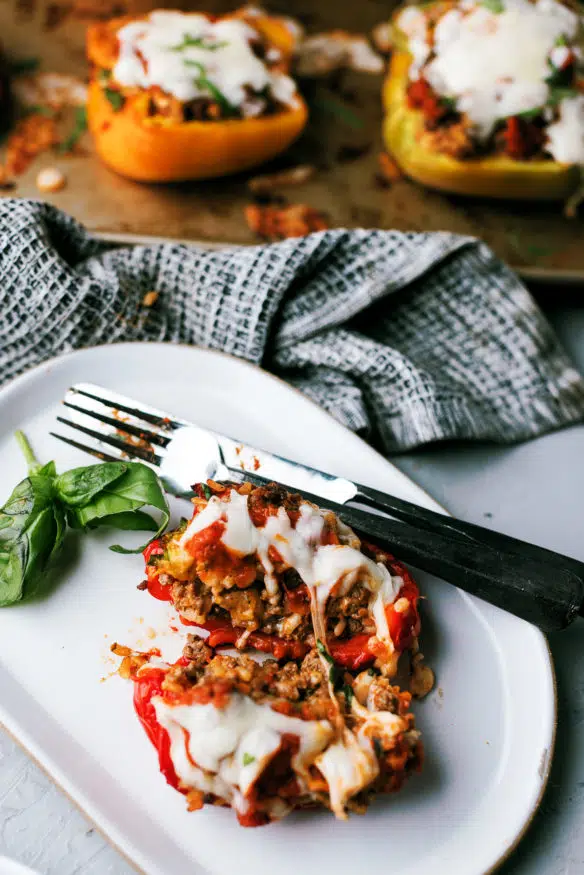 These Italian stuffed peppers are crammed with ground beef, Arborio rice, oregano, basil and other Italian spices and mozzarella cheese