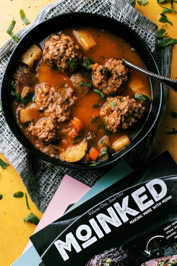 Albondigas is a meatball soup simmered in a tomato base broth flavored with a little cilantro. Kind of reminds me a little of a stew, but the flavor profile is insanely good!